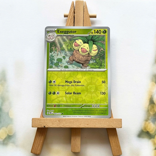 Thẻ hình Pokemon Exeggutor 002/131 - Lá bài lẻ Prismatic Evolutions Uncommon Reverse Holo tiếng Anh chính hãng