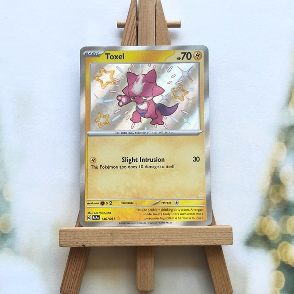 Thẻ hình Pokemon Toxel 140/091 - Lá bài Scarlet & Violet: Paldean Fates Shiny Rare tiếng Anh chính hãng