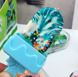 Kẹo mút que kem phủ cốm