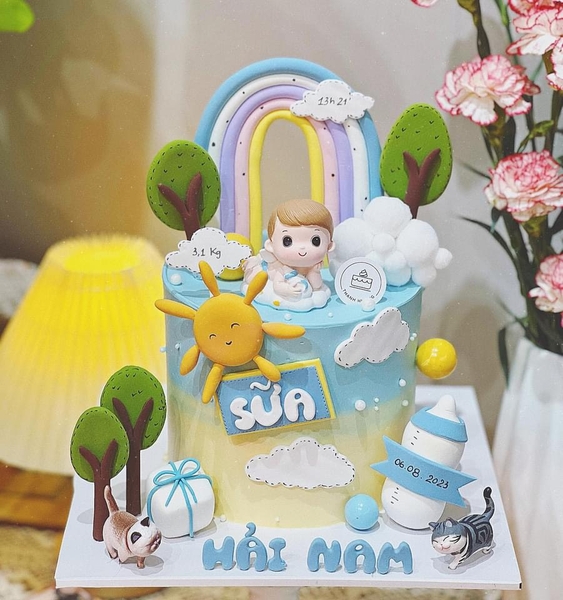 Tượng em bé nằm ôm bình sữa -BÉ TRAI (sứ).