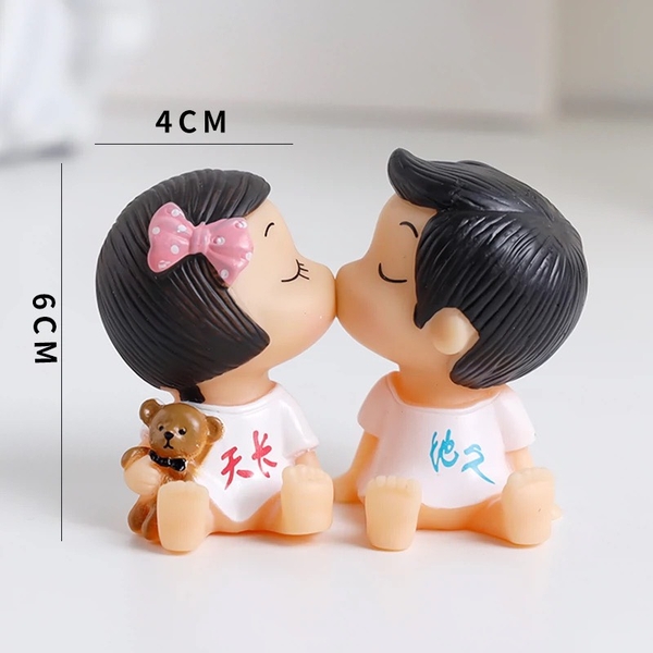Đôi em bé hôn (baby kiss nhựa).