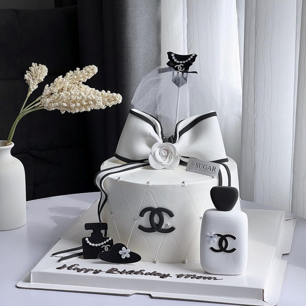 CAM-Que cắm mũ váy đen (chanel).