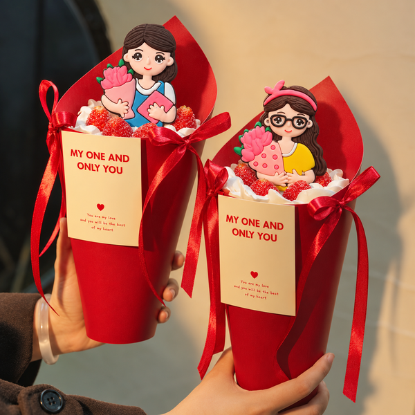 Tượng nhựa dẻo- cô gái (cô giáo) áo xanh ôm hoa.