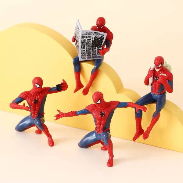 Set 4 tượng siêu nhân nhện đọc báo nhựa đặc.