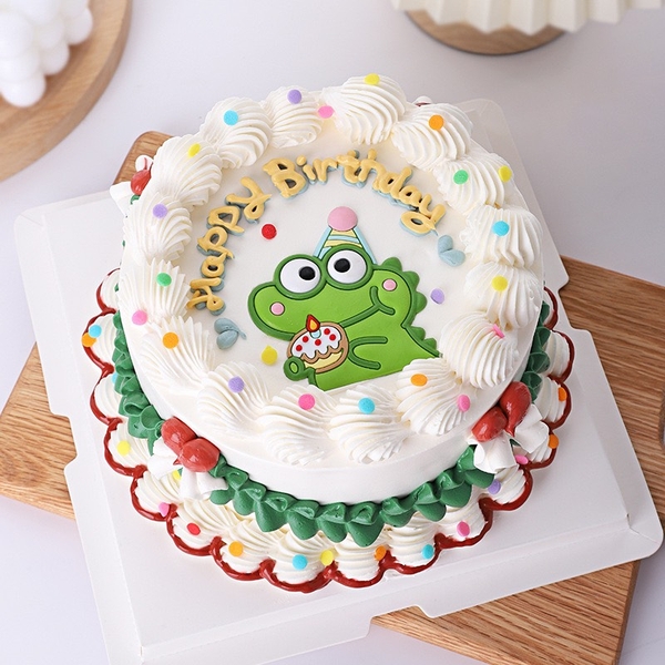 Tượng KHỦNG LONG xanh và bánh (nhựa dẻo).