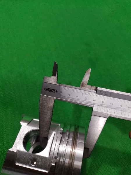 PISTON 4D94E XM DẦU 4.5 ĐỈNH TÉP CAO 104 - IZUMI ĐL