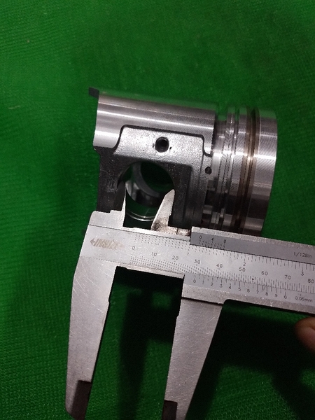 PISTON 4D94E XM DẦU 4.5 ĐỈNH TÉP CAO 104 - IZUMI ĐL