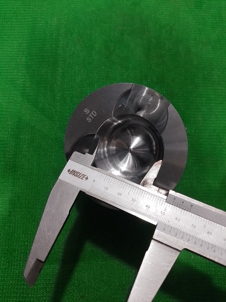 PISTON 6D95L VUÔNG (2121) NỔ 55 H94 IZUM-N