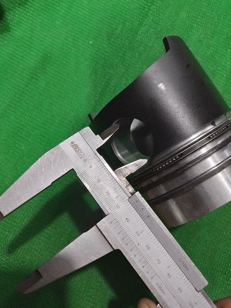 PISTON 4BD1/6BD1 nổ vuông đ.nhọn H112  ( CÓ KÈM XÉC MĂNG KONEKS XỊN)