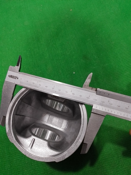 PISTON 6D114 IZUMI N66 ĐỈNH NHỌN THÂN TRẮNG KẸP THÉP