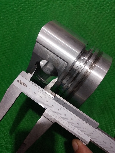 PISTON 6D105-1 NỔ VUÔNG   (MÁY ỦI) KẸP THÉP  IZUMI DL