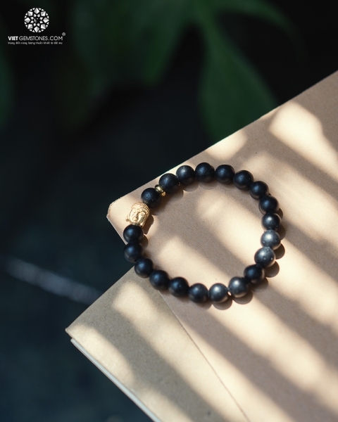 Vòng tay đá nham thạch 8mm charm Phật Diện bạc xi vàng