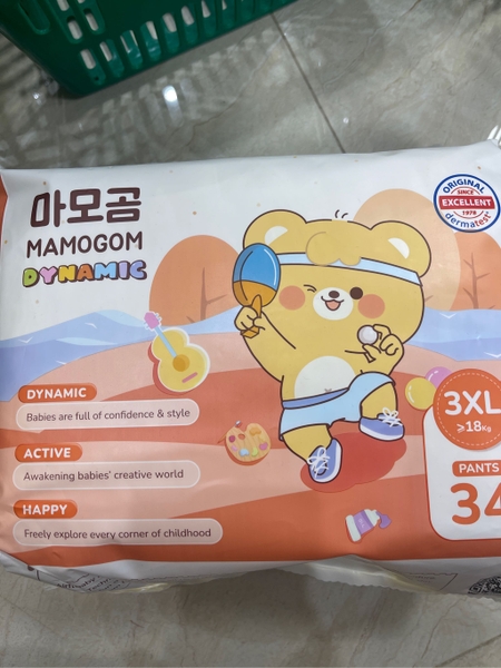Bỉm quần Mamogom Dynamic (Baby Disposable pants), Loại quần mặc. Nhãn hiệu MAMOGOM, size3XL, đóng gói 34 chiếc/túi. Chất liệu: vải không dệt, hạt Polymer siêu hấp thụ và màng PE. Hàng mới 100%