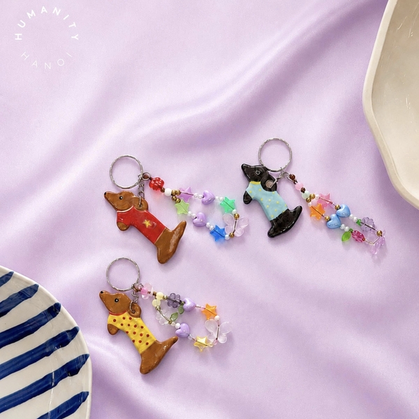 LINDO CRAFTS - Dog With Turquoise Polka Dots Shirt Ceramic Keychain