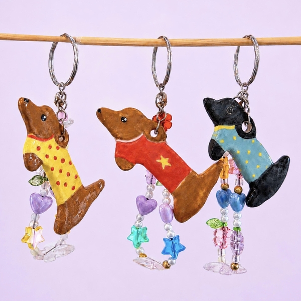 LINDO CRAFTS - Dog With Turquoise Polka Dots Shirt Ceramic Keychain