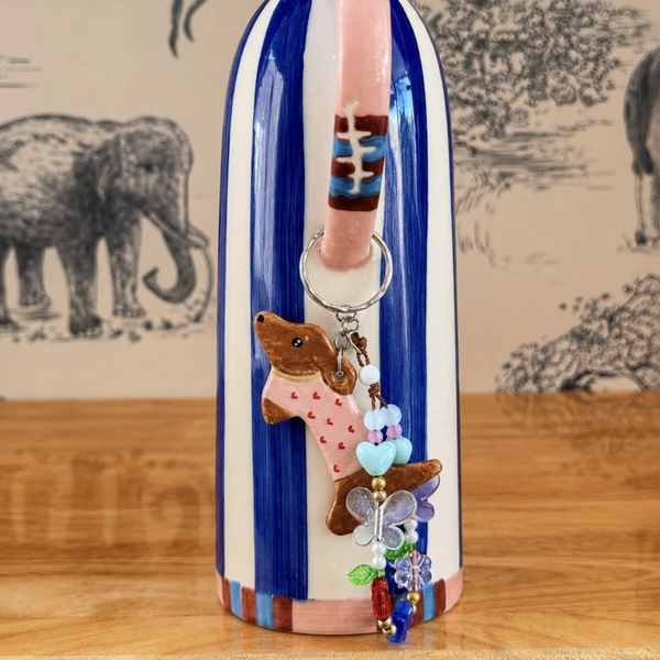 LINDO CRAFTS - Dog With Pink Polka Dots Shirt Ceramic Keychain
