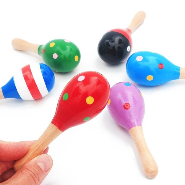Baby Maracas Wood Toy in Green With Dots