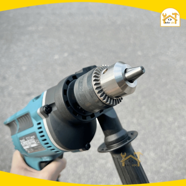 Máy khoan búa Makita M8103KX2B (kèm 26 phụ kiện) - Hàng chính hãng.