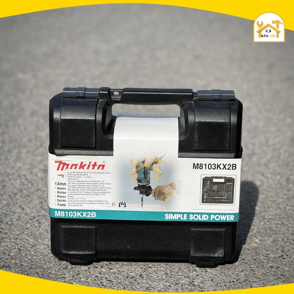 Máy khoan búa Makita M8103KX2B (kèm 26 phụ kiện) - Hàng chính hãng.