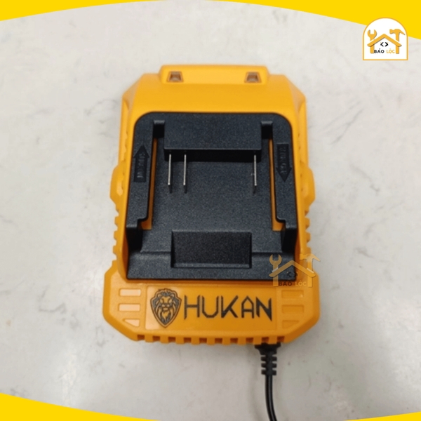 Đế sạc pin 21V Hukan HK-FSC025APro chân pin phổ thông, dòng sạc nhanh 2.5A, có đèn báo đầy, sạc nhanh hơn 35%