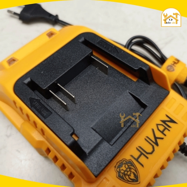 Đế sạc pin 21V Hukan HK-FSC025APro chân pin phổ thông, dòng sạc nhanh 2.5A, có đèn báo đầy, sạc nhanh hơn 35%