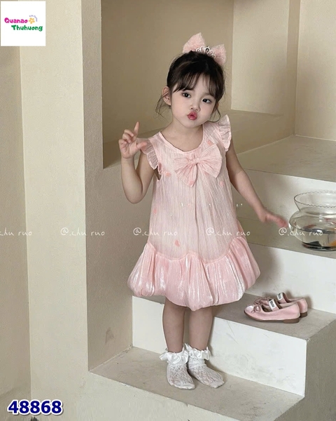 Đầm cam đính nơ trái tim