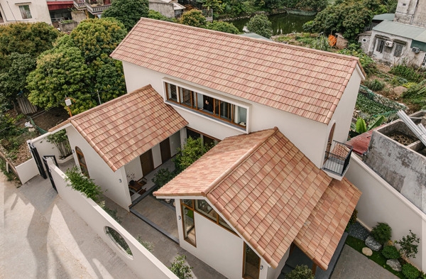 Villa tam hợp viện đưa xưởng xay xát cũ vào không gian sống mới