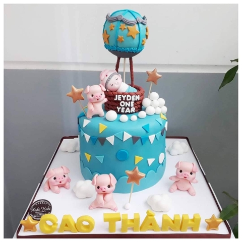 Bánh fondant thôi nôi bé trai tuổi heo