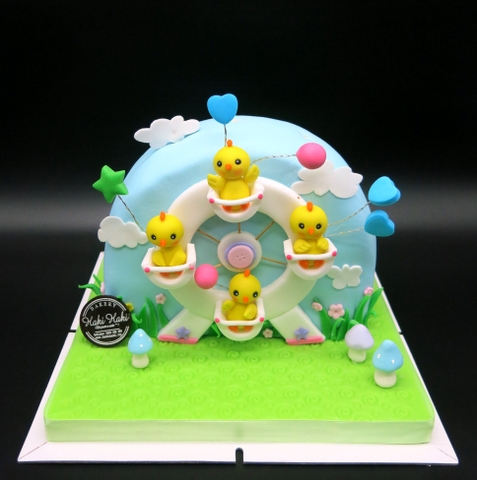 Bánh fondant vòng quay gà con màu hồng