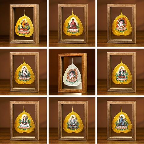 Khung tranh lá bồ đề vẽ Phật Bổn Tôn nền vàng