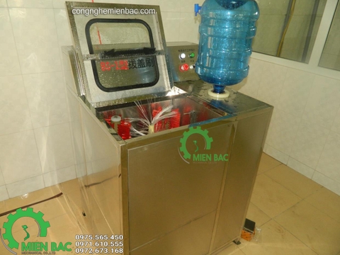 Máy rửa và nhổ nắp bình
