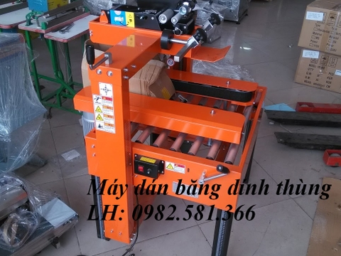 Máy dán băng dính thùng carton, máy dán băng keo thùng giấy