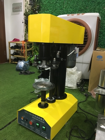 Máy viền nắp lon, máy viền nắp lon sữa bột,máy viền nắp lon thiếc
