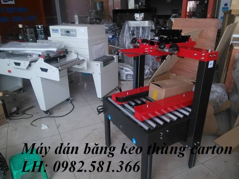 Máy dán băng dính thùng carton, máy dán băng keo thùng giấy