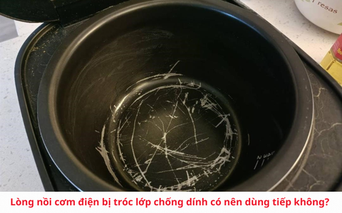 Lòng nồi cơm điện bị tróc lớp chống dính có nên dùng tiếp không?