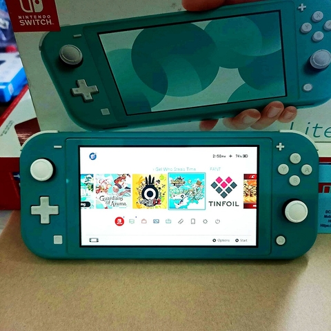 Switch Lite xanh ngọc, hàng 2nd hand fullbox đã modchip