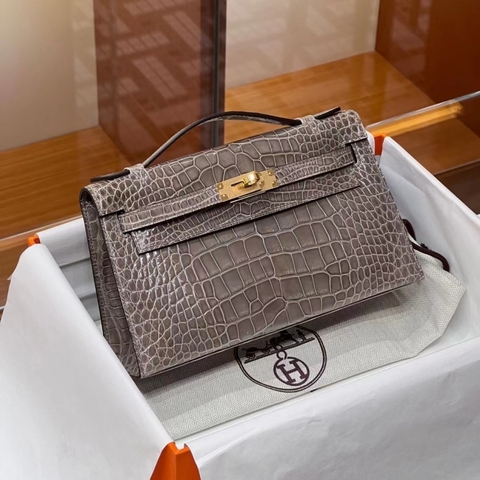 TÚI HERMES Kelly Pochette Niloticus Gris Elephant  da cá sấu sông Nile 22CM(giá liên hệ)