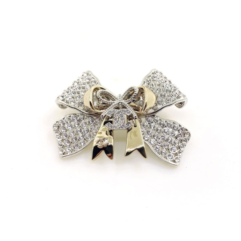 TRÂM CÀI CHANEL 25B NƠ VÀNG ĐEN ORNAMENT