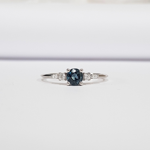 TEAL SAPPHIRE AND DIAMOND ENGAGEMENT RING