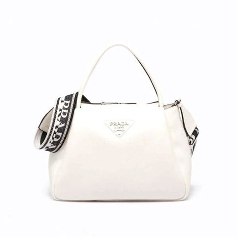 TÚI Prada Women Large Leather Handbag with the Prada Metal Lettering Logo Gleaming at Its Center-White