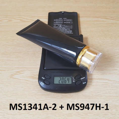 Tuýp tròn đen bóng nắp vàng 100ml