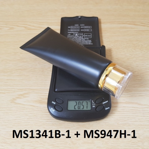 Tuýp tròn đen nhám nắp vàng 100ml