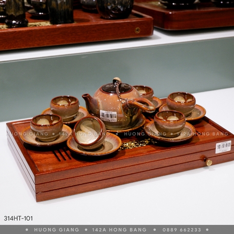 Bộ ấm chén tay ngang lỗ gấm lòng hoa