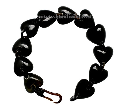 Solid horn bangle bracelet with heart shape