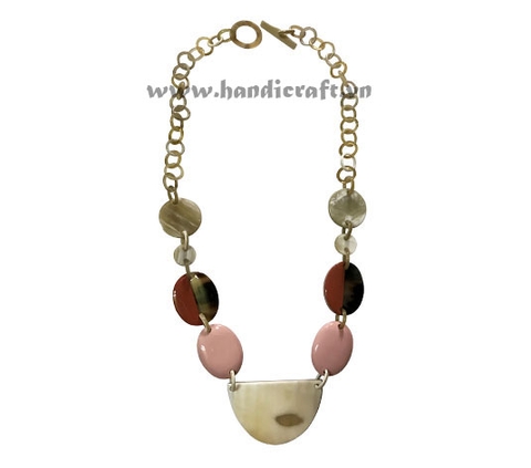 Natural horn with pink & red lacquer