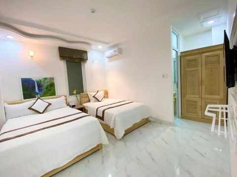 Phòng 2 Giường - 3 Người ( Caroline Beach Hotel )