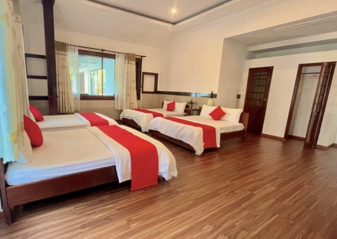 Phòng Gia Đình 4 Giường Đôi ( Caroline Resort )