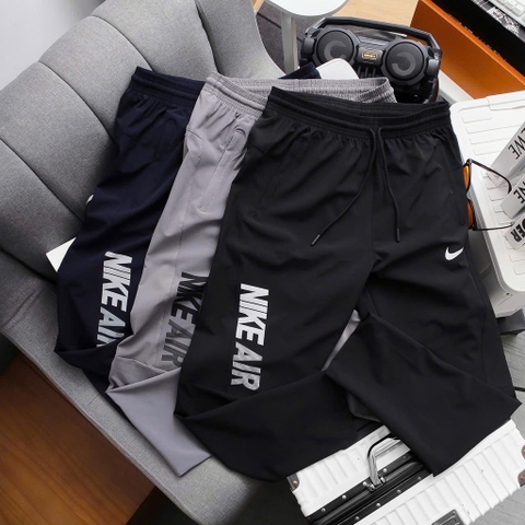 Quần dài Nike vải dù ống suông