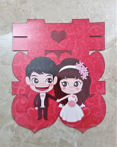 Chữ hỷ dán cô dâu chú rể cầm tay