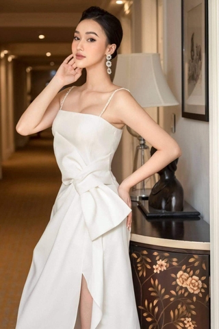 Đầm xòe hai dây cúp ngực phối nơ eo xẻ tà dự tiệc